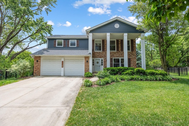 1125 Huntleigh Dr, Naperville, IL 60540 - greek revival inspired property featuring concrete driveway, brick siding, and a garage