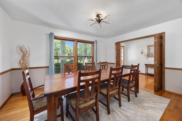 1125 Huntleigh Dr, Naperville, IL 60540 - dining area with light wood-type flooring and baseboards