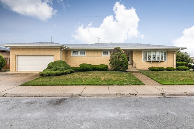 8560 W Winona St, Chicago, IL 60656 - ranch-style home with a garage, brick siding, concrete driveway, and a front lawn