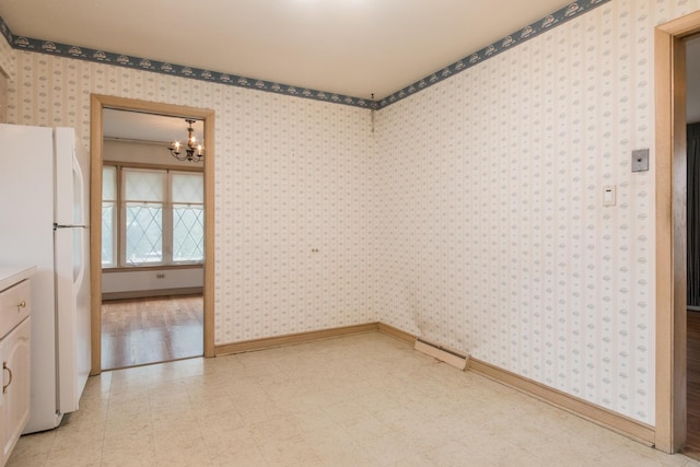 8560 W Winona St, Chicago, IL 60656 - unfurnished room with a chandelier, light floors, and wallpapered walls