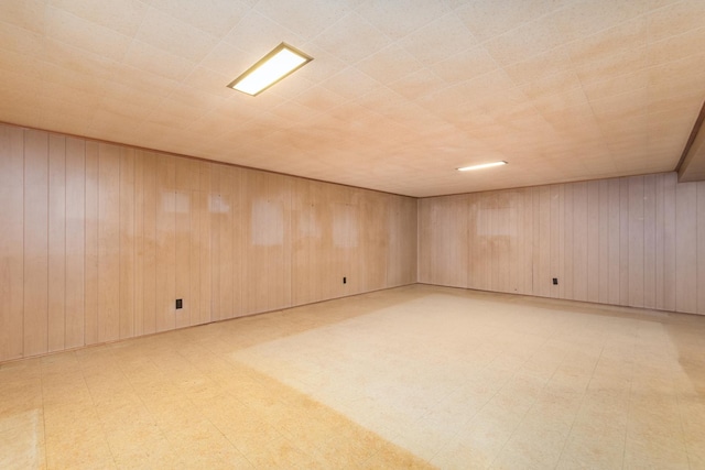 8560 W Winona St, Chicago, IL 60656 - spare room with light flooring and wooden walls