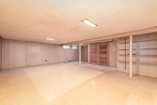 8560 W Winona St, Chicago, IL 60656 - finished below grade area featuring light flooring and wood walls