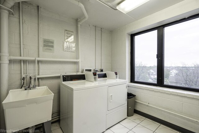 9737 N Fox Glen Dr Unit 4A, Niles, IL 60714 - community laundry room with washer and clothes dryer and concrete block wall