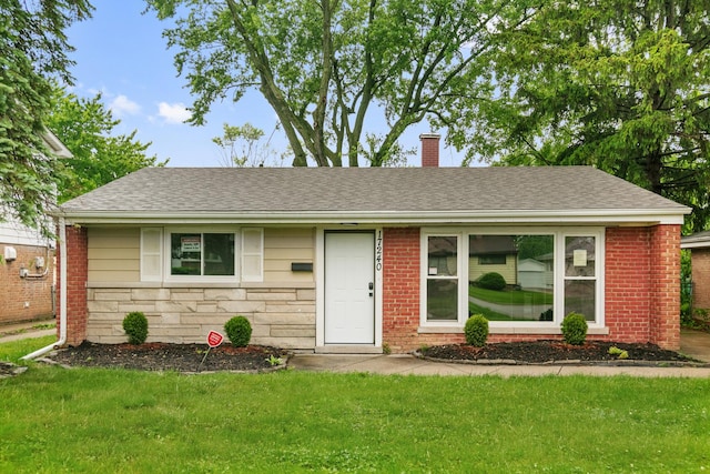 17240 Roy St, Lansing, IL 60438 - single story home featuring a front yard, a chimney, a shingled roof, and stone siding