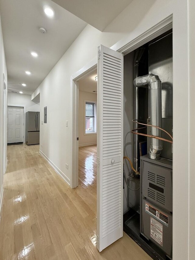 4032 W Wilcox St, Chicago, IL 60624 - hallway with light wood finished floors, recessed lighting, and baseboards