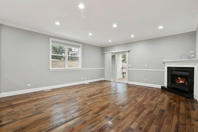 1505 N Talman Ave Unit 1, Chicago, IL 60622 - unfurnished living room featuring crown molding, dark wood-style flooring, baseboards, recessed lighting, and a warm lit fireplace