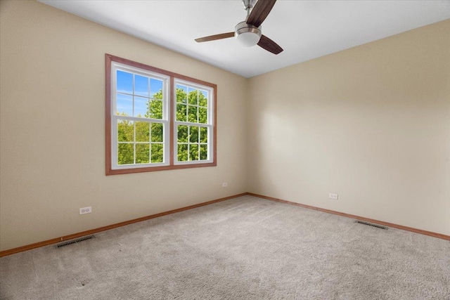1132 10 Pin Ln, Beach Park, IL 60099 - unfurnished room with baseboards, light colored carpet, and a ceiling fan