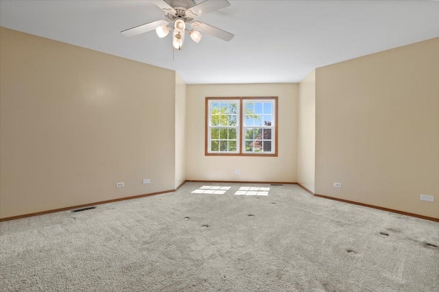 1132 10 Pin Ln, Beach Park, IL 60099 - unfurnished room with carpet flooring, baseboards, and a ceiling fan