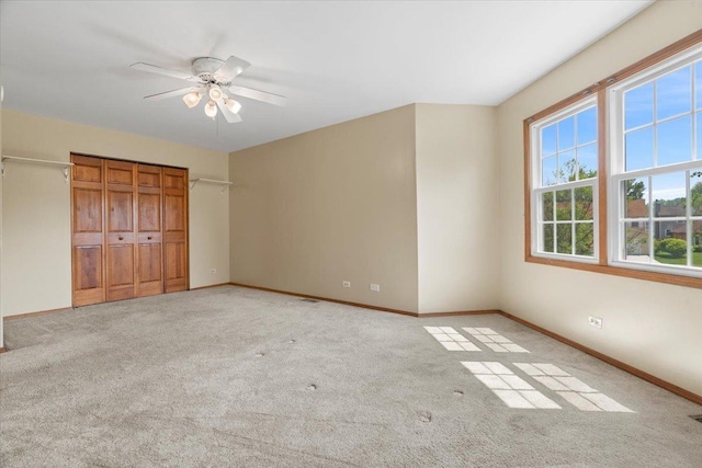 1132 10 Pin Ln, Beach Park, IL 60099 - unfurnished bedroom featuring carpet floors, baseboards, ceiling fan, and a closet