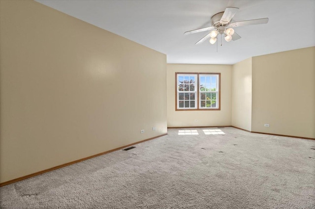 1132 10 Pin Ln, Beach Park, IL 60099 - empty room featuring baseboards, carpet, and ceiling fan