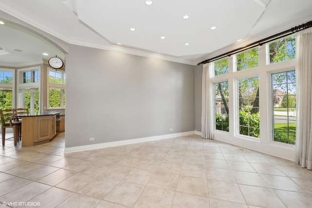 29026 N Brassie Ct, Ivanhoe, IL 60060 - empty room with plenty of natural light, light tile patterned floors, arched walkways, ornamental molding, and recessed lighting