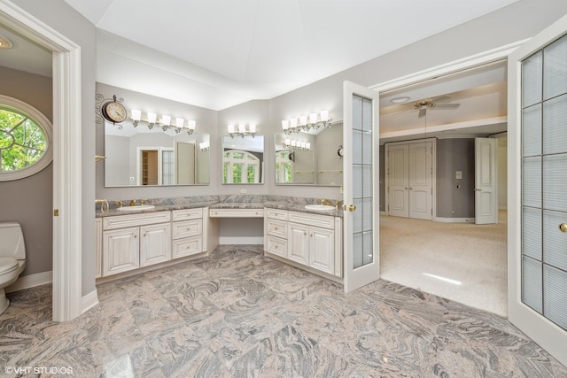 29026 N Brassie Ct, Ivanhoe, IL 60060 - full bathroom featuring vanity, ceiling fan, toilet, and baseboards