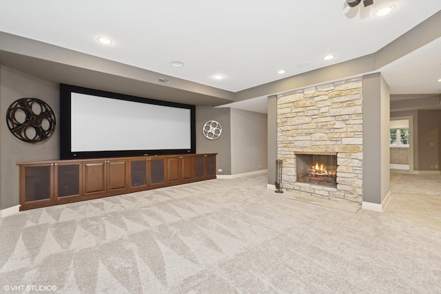 29026 N Brassie Ct, Ivanhoe, IL 60060 - home theater room featuring light carpet, baseboards, recessed lighting, and a fireplace