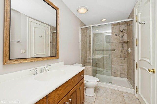 29026 N Brassie Ct, Ivanhoe, IL 60060 - full bathroom featuring vanity, toilet, a shower stall, tile patterned floors, and recessed lighting