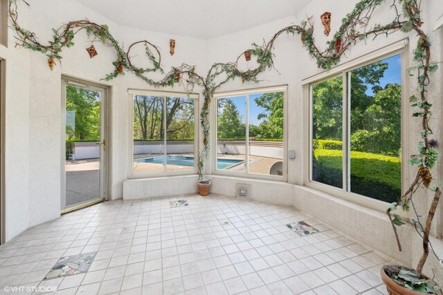 29026 N Brassie Ct, Ivanhoe, IL 60060 - unfurnished sunroom featuring tile patterned floors