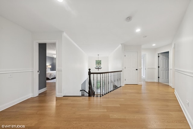 6724 Greene Rd, Woodridge, IL 60517 - hall featuring an upstairs landing, light wood finished floors, a chandelier, recessed lighting, and baseboards