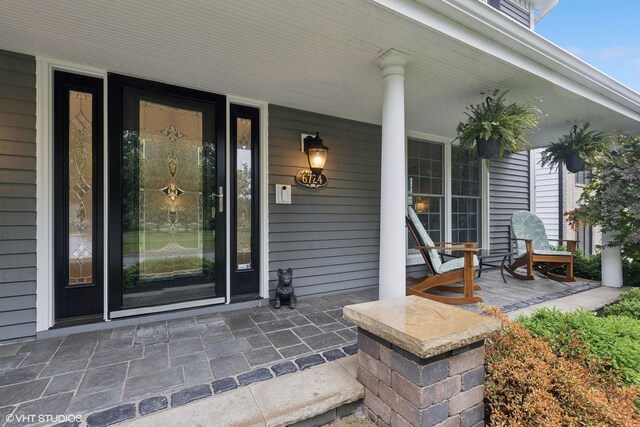 6724 Greene Rd, Woodridge, IL 60517 - entrance to property featuring a porch