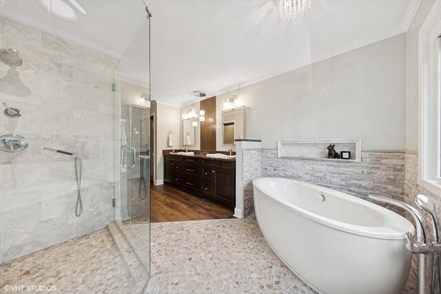 6724 Greene Rd, Woodridge, IL 60517 - bathroom with a stall shower, ornamental molding, a freestanding tub, double vanity, and tile walls