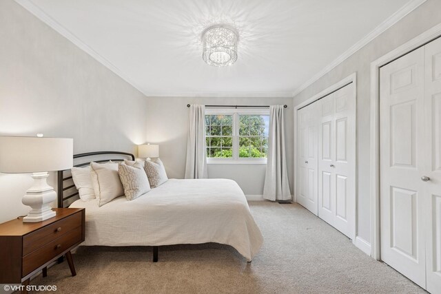 6724 Greene Rd, Woodridge, IL 60517 - carpeted bedroom featuring crown molding, a chandelier, and baseboards