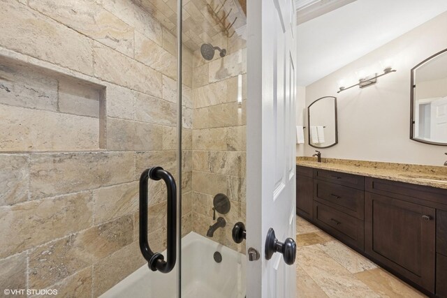 6724 Greene Rd, Woodridge, IL 60517 - full bathroom with double vanity, shower / bath combination, and stone finish floors