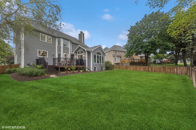 6724 Greene Rd, Woodridge, IL 60517 - back of house featuring a chimney and a deck
