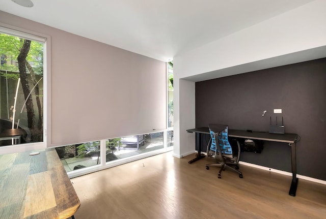 839 N Hermitage Ave Unit 101, Chicago, IL 60622 - office area featuring wood finished floors and baseboards