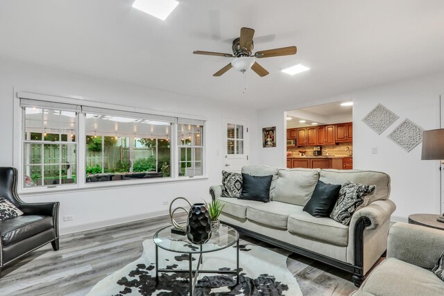 2310 Malik Ct, Glenview, IL 60025 - living room featuring light wood-type flooring and ceiling fan