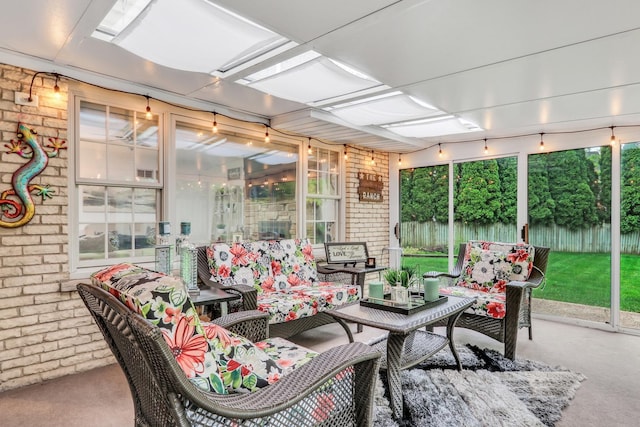 2310 Malik Ct, Glenview, IL 60025 - sunroom featuring brick wall, carpet flooring, and an outdoor living space