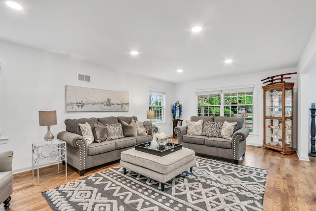 2310 Malik Ct, Glenview, IL 60025 - living room featuring recessed lighting, wood finished floors, and baseboards