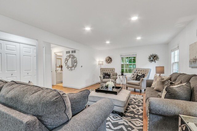 2310 Malik Ct, Glenview, IL 60025 - living area with plenty of natural light, recessed lighting, and light wood-style floors