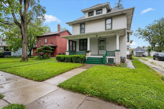 311 N Ave, Naperville, IL 60540 - traditional style home featuring covered porch and a front lawn