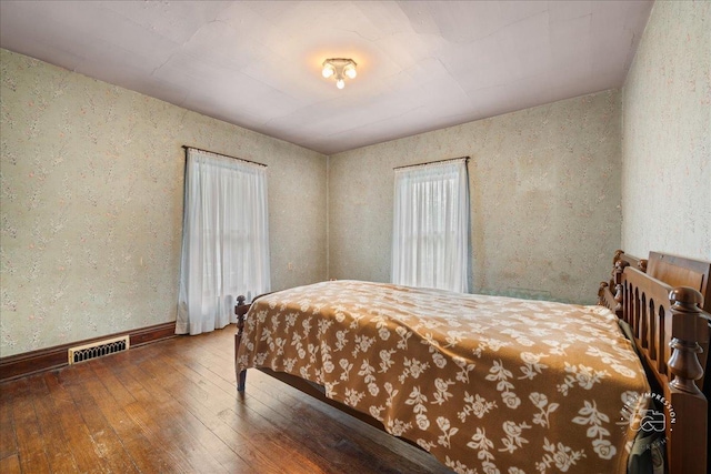 311 N Ave, Naperville, IL 60540 - bedroom with wood-type flooring, a textured wall, and baseboards