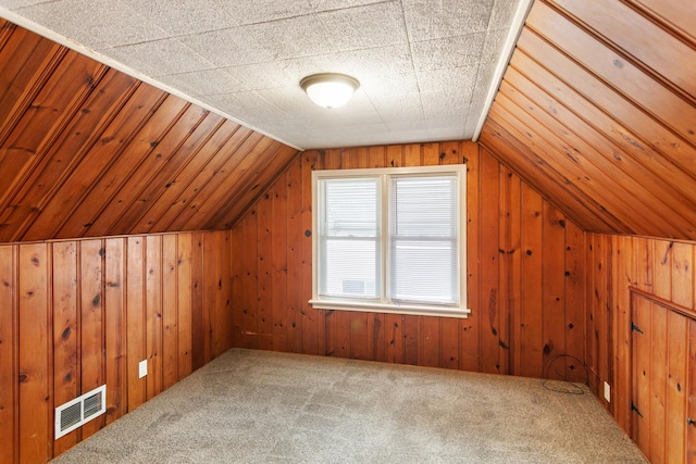 3256 186th St, Lansing, IL 60438 - additional living space featuring vaulted ceiling, carpet floors, and wood walls