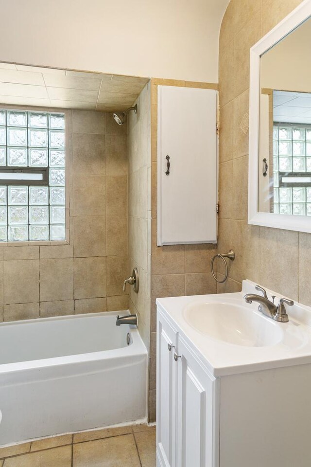 3256 186th St, Lansing, IL 60438 - bathroom featuring vanity, plenty of natural light, shower / bath combination, tile walls, and tile patterned floors