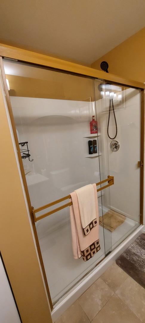 39806 Waterloo Dr, Beach Park, IL 60083 - full bath featuring a shower stall and tile patterned floors