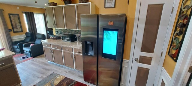 39806 Waterloo Dr, Beach Park, IL 60083 - kitchen with stainless steel refrigerator with ice dispenser, tasteful backsplash, and light wood-type flooring