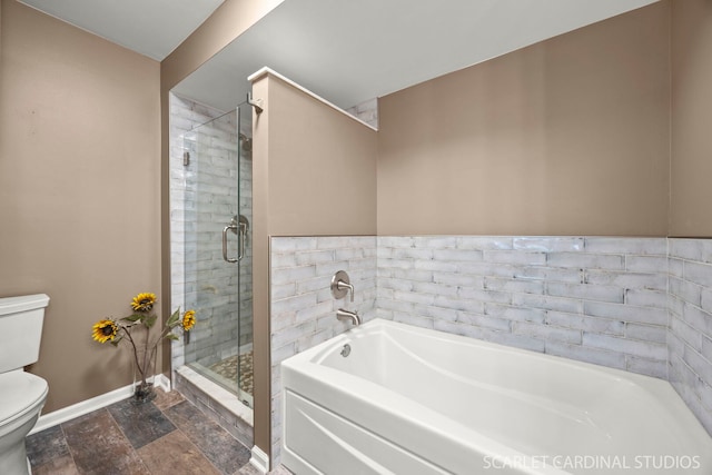 2312 Scott Ln Unit 2312, Aurora, IL 60502 - bathroom featuring a bath, a shower stall, and stone finish floors
