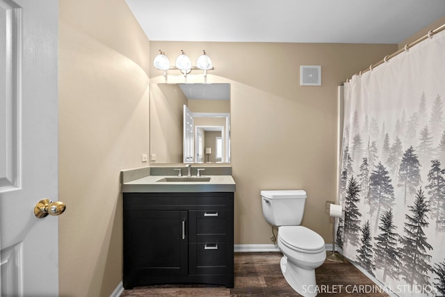 2312 Scott Ln Unit 2312, Aurora, IL 60502 - full bathroom with vanity, wood finished floors, and a shower with shower curtain