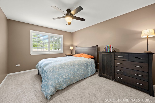 2312 Scott Ln Unit 2312, Aurora, IL 60502 - bedroom with light colored carpet and ceiling fan