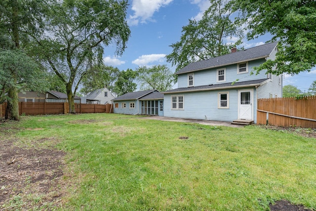 1018 Jericho Rd, Aurora, IL 60506 - back of property featuring entry steps and a chimney