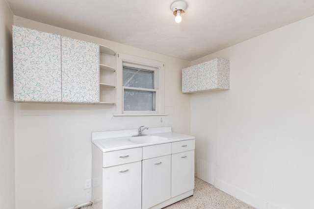 1018 Jericho Rd, Aurora, IL 60506 - bathroom with speckled floor and vanity