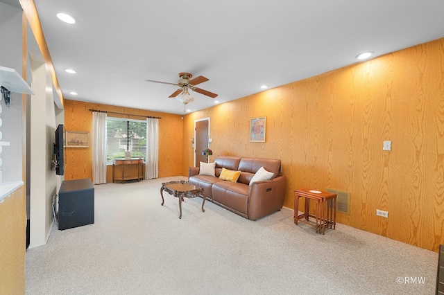 380 Ventura Club Dr, Roselle, IL 60172 - living room featuring a ceiling fan, carpet, recessed lighting, and wooden walls