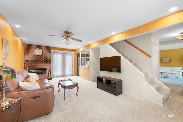 380 Ventura Club Dr, Roselle, IL 60172 - living area with a ceiling fan, carpet, a brick fireplace, stairs, and recessed lighting