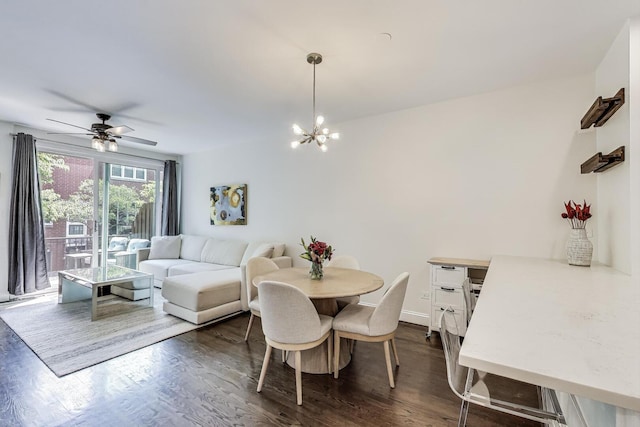 2801 N Wolcott Ave Unit L, Chicago, IL 60657 - dining area with dark wood-type flooring, a ceiling fan, and a chandelier