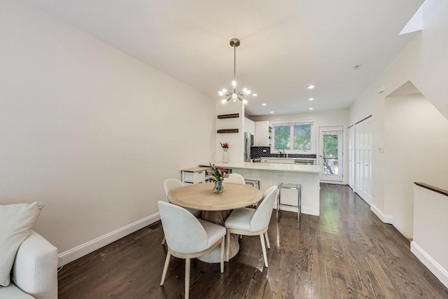 2801 N Wolcott Ave Unit L, Chicago, IL 60657 - dining room with dark wood-style floors, baseboards, a chandelier, and recessed lighting