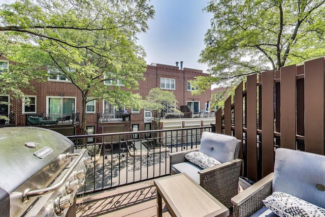 2801 N Wolcott Ave Unit L, Chicago, IL 60657 - wooden deck featuring a grill