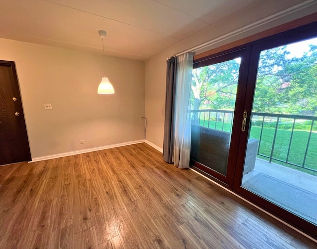 2310 Woodbridge Way Unit 1B, Lombard, IL 60148 - spare room featuring wood finished floors