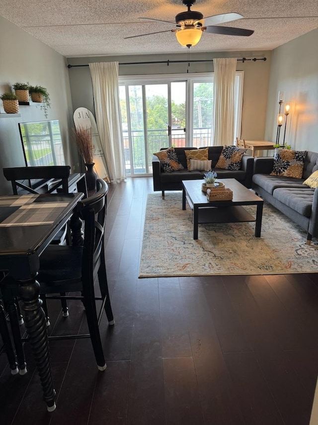 5555 N Cumberland Ave Unit 407, Chicago, IL 60656 - living area featuring a ceiling fan, a textured ceiling, and dark wood finished floors