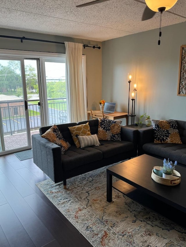 5555 N Cumberland Ave Unit 407, Chicago, IL 60656 - living area featuring a ceiling fan and a textured ceiling