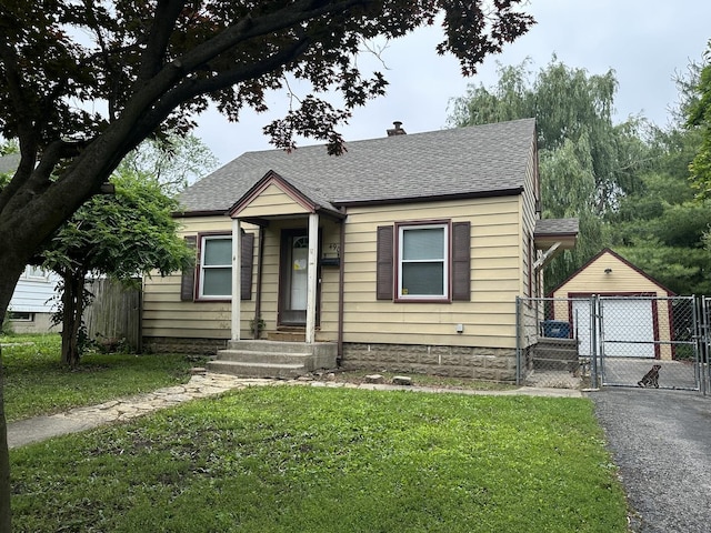 490 Country Club Dr, Kankakee, IL 60901 - bungalow-style home with a gate, a shingled roof, a garage, and a chimney